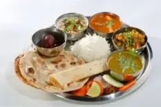 Thali costs up 2%25 in April as tomato prices surge 38%25, LPG rises: Crisil