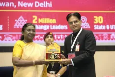 How did the Women and Child Development Ministry earn an award for Anganwadis in tribal areas?