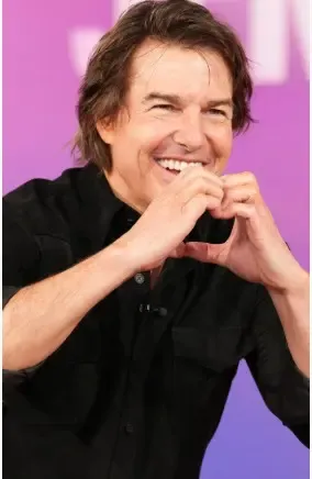 Tom Cruise recalls puking on first fighter jet flight, teases Top Gun 3