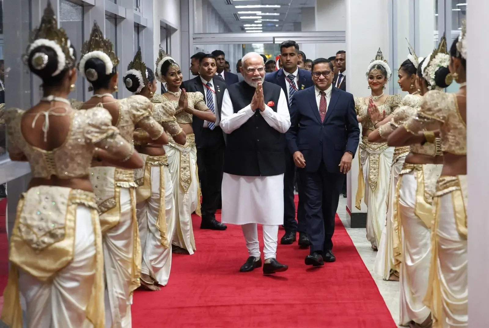 Prominent Lankan Ministers and Indian Diaspora Extend Warm Welcome to PM Modi in Colombo Despite Heavy Rain