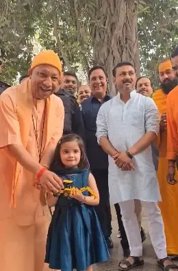 A Toy Bulldozer Brings Joy: Young Girl's Heartwarming Gift to CM Yogi Adityanath