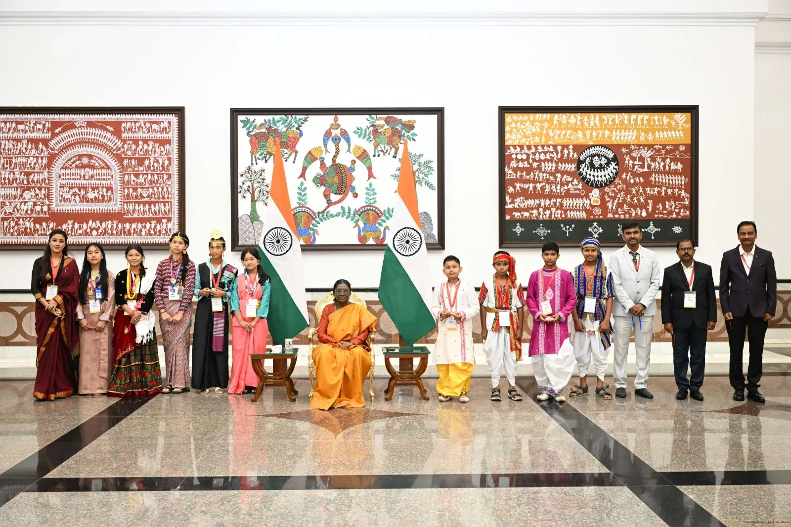 Tripura students tie rakhi on President Murmu at Rashtrapati Bhavan