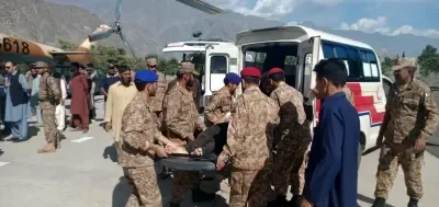 How did two separate road accidents claim 23 lives across Pakistan?