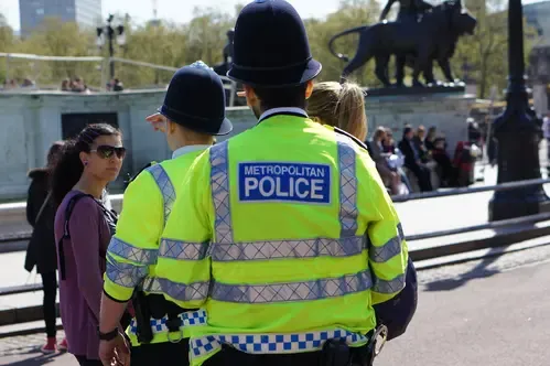 Was a man arrested after a woman was found dead in London?