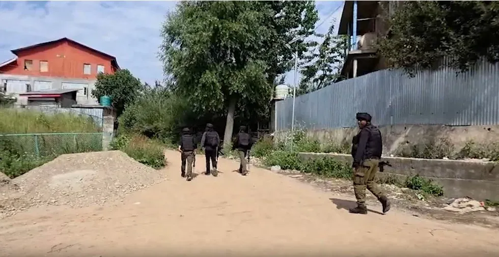 Unidentified body found at Shopian encounter site; arms recovered