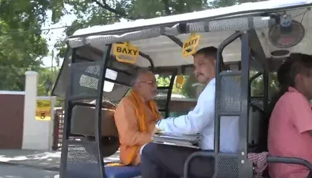 UP Finance Minister Suresh Khanna rides e-rickshaw to office amid Modi fuel-saving push
