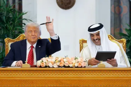 What are the implications of the US's $243.5 billion deals with Qatar?