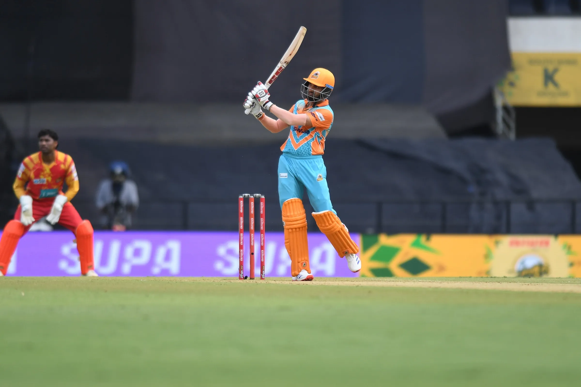 How Did the Orange Tigers Defeat the Nagpur Titans by Eight Wickets?