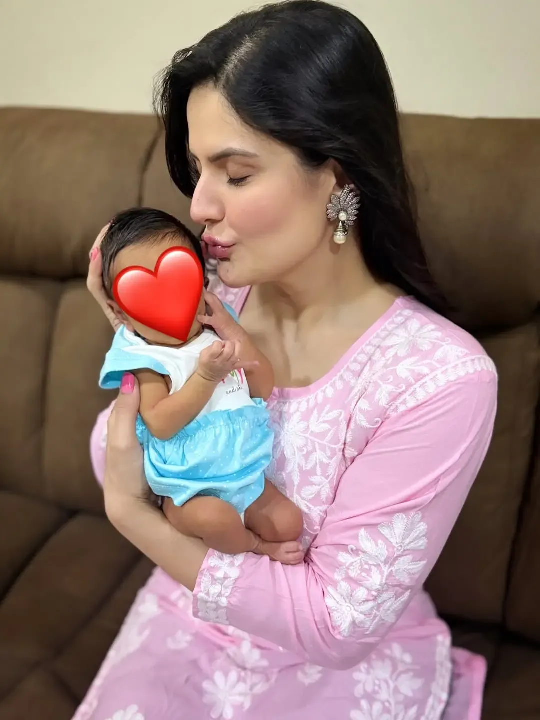 Did Zareen Khan Pamper Her Niece with a Foot Massage on Her 4-Month Birthday?